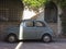 An hold Fiat 500. light blue color