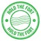 HOLD THE FORT text written on green round postal stamp sign