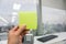 Hold a mockup green postit