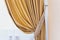 Holder for room curtains. Fragment photo curtain, interior detail, curtain detail close up.