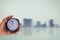 Holding clock on blurred background The time 12:00 am or p