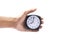 Holding clock on isolated background The time 12:00 am or pm and