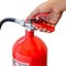 Holding fire extinguisher