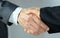 Holding hands with business partners to trust business partners, relationships to achieve future commercial and investment goals