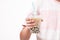 Holding a plastic glass of refreshing Taiwan iced milk tea with