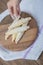 Holding a platter of caucasian mutaki cookies