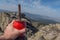 Holding a traditional mate at the peak of the mountain.