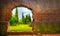 Hole in wall garden eden gate horizontal background broken