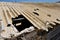 Holes in the Asbestos cement roof covering