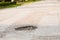 Holes on the road. dangerous pothole in the asphalt highway.Outdoor