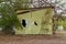 Holes In The Wall Of An Old Hut