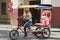 Holguin, Cuba 12/12/2018 Cyclo taxi or rickshaw waiting for passengers