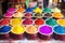 holi festival colorful powders in small bowls