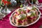 Holiday appetizer: Canapes in the form of a star with pickled herring, beetroot dip and dill