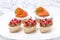 Holiday appetizers - canape with salmon, tartlet with liver pate