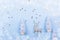 Holiday background .Christmas decorations on a snowy background with hoarfrost Deer, trees and snowflakes. Blue pastel background