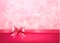 Holiday background with gift pink bow and ribbon