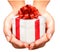 Holiday background with hands holding gift boxes. Concept of giving presents