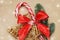 Holiday background image of peppermint candy sticks with Red Bow and golden Decorative Star and Fir Branches on