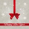 Holiday bokeh background with red ribbon and bow. Greeting card with snowflakes. Christmas abstract background with text.