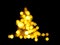 Holiday bokeh golden lights Defocused shiny evergreen tree shape