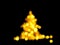 Holiday bokeh golden lights Defocused shiny evergreen tree shape
