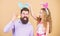 Holiday bunny long ears. Family tradition concept. Dad and daughter wear bunny ears. Father and child celebrate easter