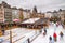 Holiday cityscape - view of the Christmas city skating rink on background the Cologne Cathedral