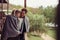 Holiday couple in hotel balcony wrapped in blanket