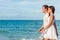 Holiday couple relaxing walking on beach