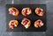 Holiday cranberry apple crostini appetizers. Above view on a slate serving platter.