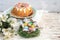 Holiday cupcake, colored eggs in a nest, Easter Christian traditional holiday