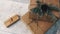 Holiday delivery boxes, parcels wrapped in brown paper, decorated and tied with rough twine, stone background