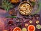 Holiday food background for baking cookies with cutters, spices, fruits, cranberries, nuts, dried apples, chocolate, raisin, on