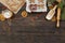 Holiday food background for baking gingerbread cookies with cutters, rolling pin and spices on vintage table top view