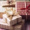 Holiday gifts and presents, country cottage style wrapped gift boxes for boxing day, Christmas, Valentines day and holidays