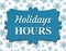 Holiday Hours blue sign with snowflakes