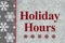 Holiday Hours message with gray and white snowflakes