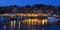 Holiday makers dining in harbor side restaurants Molyvos Greece