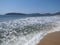 Holiday panorama of sandy beach at bay of ACAPULCO city in Mexico and white waves of Pacific Ocean landscape