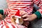 Holiday Pets Christmas guinea pig Cute boy hugs his pets guinea pig Boy in red Santa Hat