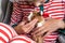 Holiday Pets Christmas guinea pig Cute boy hugs his pets guinea pig Boy in red Santa Hat