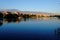 Holiday resort at lake in gentle sunset light