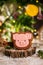 Holiday traditional food bakery. Gingerbread pink pig head in cozy warm decoration with garland lights