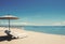 Holiday vacation at the beach, Beach deck chairs with parasol on tranquil beach