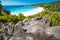 Holiday vacation at beautiful Grand Anse beach on La Digue island, Seychelles