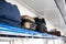 Holiday vacation, tourism, travel, modern train interior, of railway transportation concept. Luggage on shelf railway train