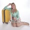 Holidaymaker with passport and suitcase