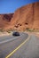 Holidaymakers On Road to Uluru