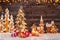 Holidays background with illuminated Christmas tree, gifts and w